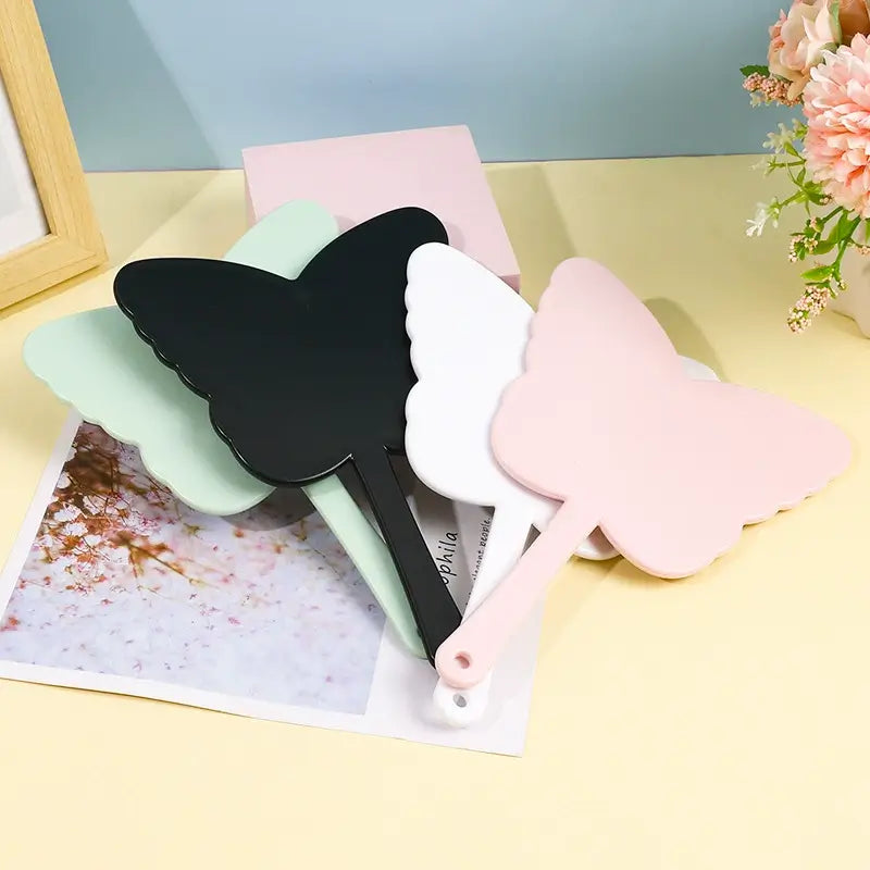 4 color butterfly-shaped handheld makeup mirror portable HD small mirror