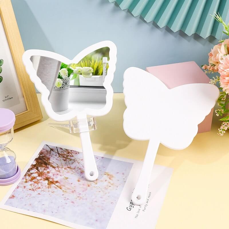 4 color butterfly-shaped handheld makeup mirror portable HD small mirror